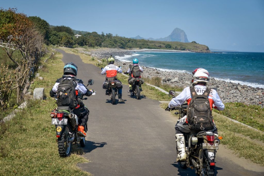 We ride along the beach in south Flores on our way to Wae Rebo