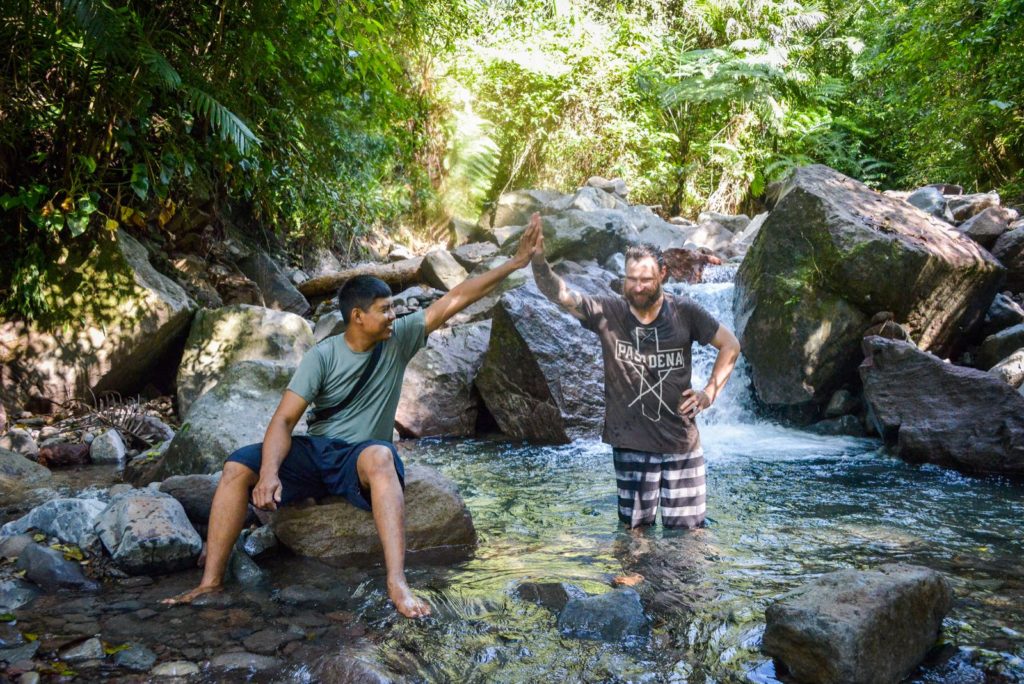 Morning swim in a remote waterfall on Flores Island