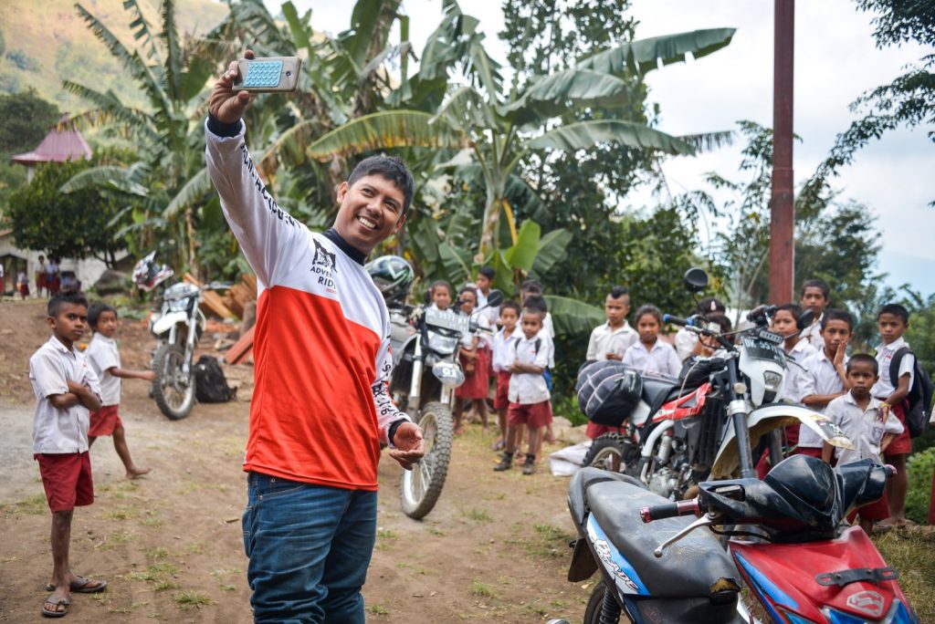 A local village school in East Nusa Tenggara welcomes the adventure riders